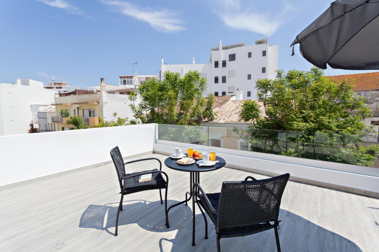 Faro Clara Suites Экстерьер фото
